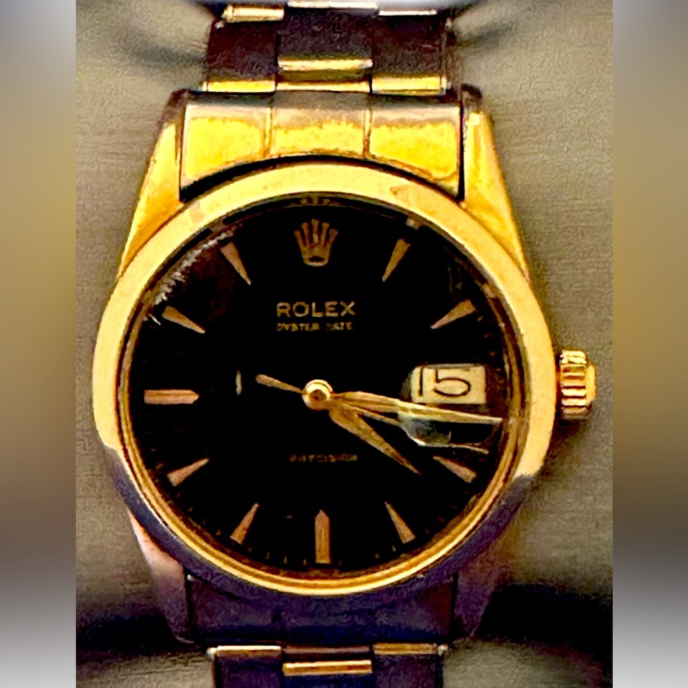 ROLEX Men's Oyster Date Gold-Plated Watch, Black Dial, Ref. 3131, 1950s.